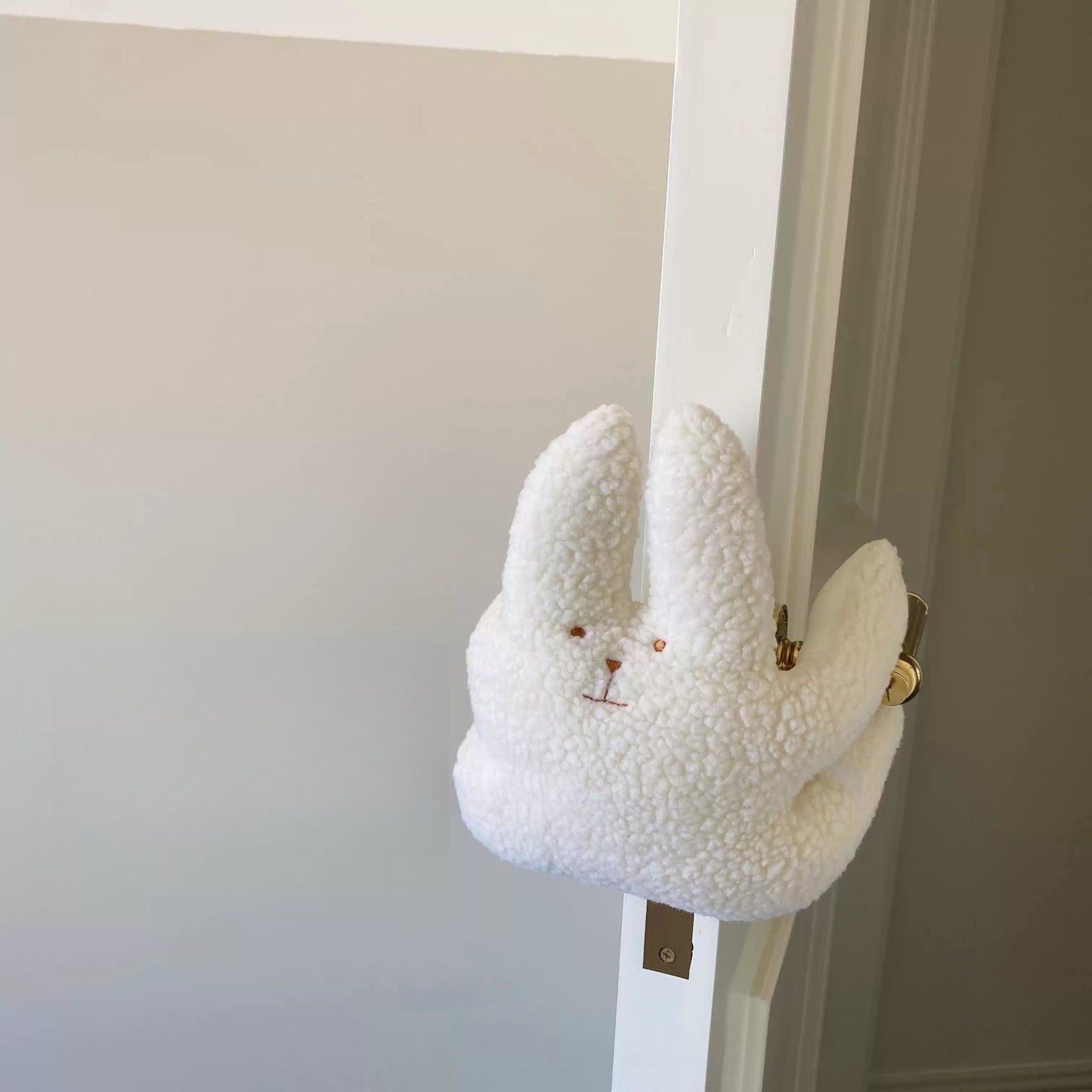 Aranyos plüss ajtóstop