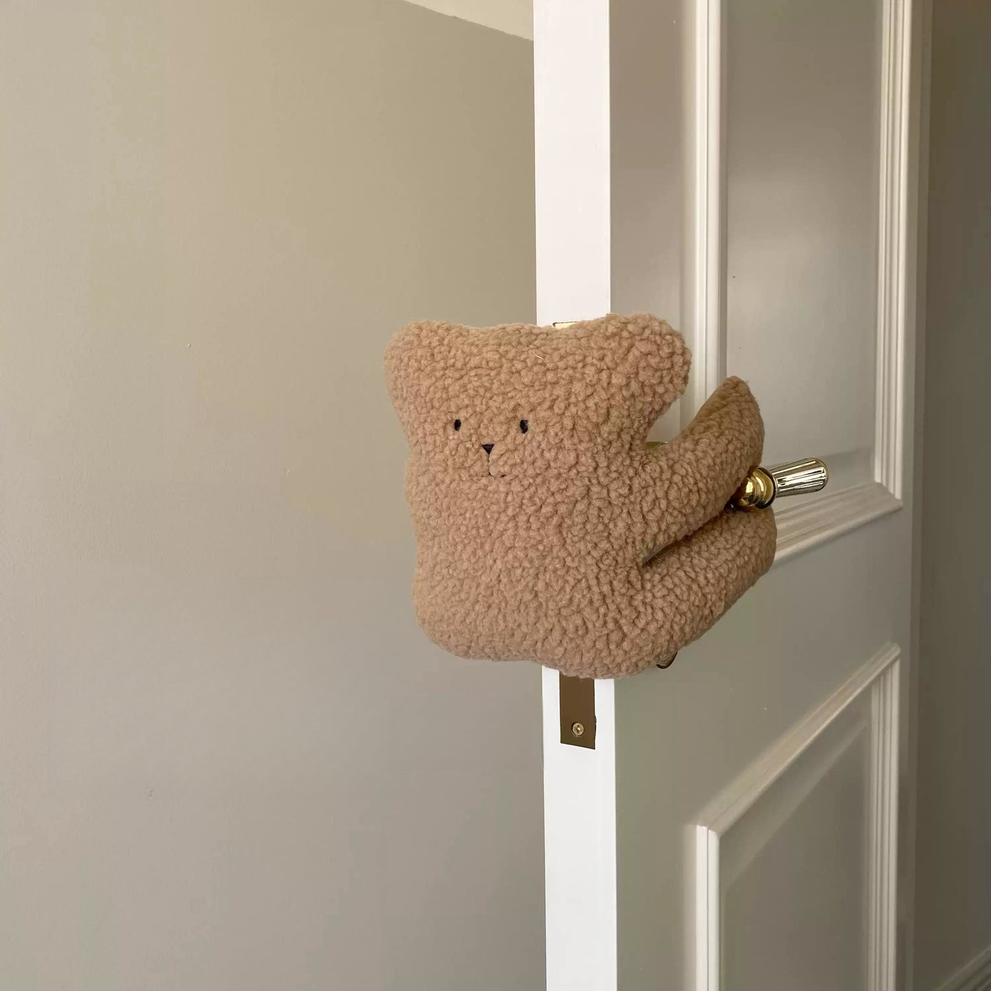 Aranyos plüss ajtóstop